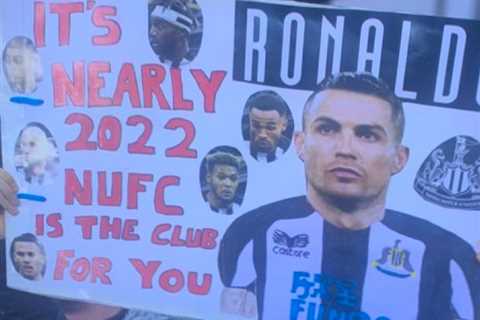 Newcastle fan holds up hilarious sign urging Cristiano Ronaldo to join club from Man Utd in the..