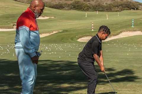 Mike Tyson takes son Morocco, 11, to play golf as boxing legend tries hand at new sport