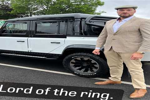 ‘Lord of the Ring’ – Tyson Fury suited and booted as he poses alongside luxury jeep while enjoying..