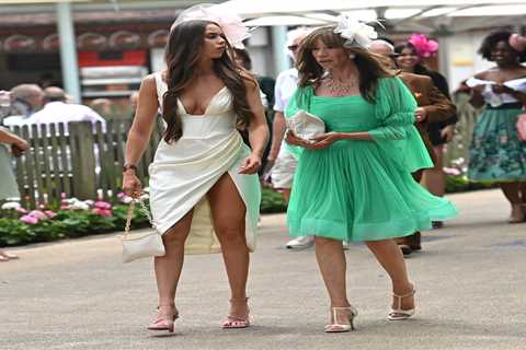 Glamorous Newmarket racegoers wear eye-catching dresses and bold fascinators as they enjoy Ladies..