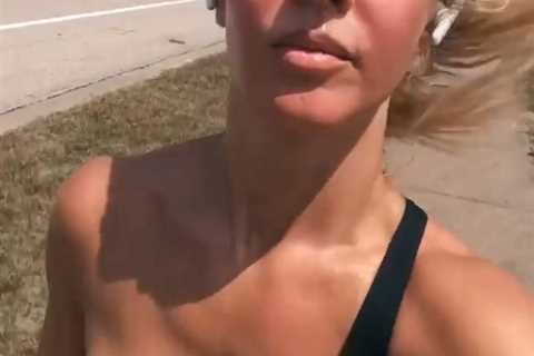 UFC beauty Laura Sanko risks wardrobe malfunction while running and tanning at same time