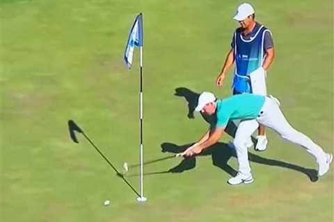 Watch furious Rory McIlroy throw fan’s remote control golf ball into water before security kick..