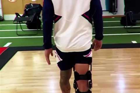 Watch Gabriel Jesus struggle to walk in knee brace as Arsenal star posts injury update video in the ..