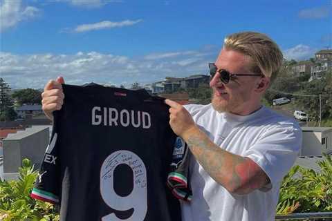 Australia star Jason Cummings finally gets his hands on Olivier Giroud’s shirt following World Cup..