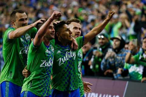 Seattle Sounders carrying MLS banner at Club World Cup