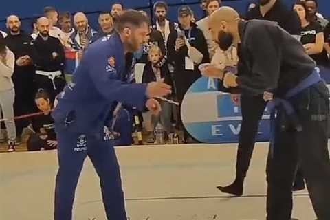 Tom Hardy wins gold in jiu-jitsu competition after BODYSLAMMING rival in brutal fight but is left..