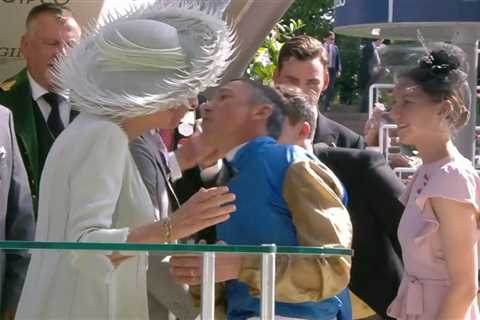 Moment jockey Frankie Dettori breaks Royal protocol by giving Camilla a kiss as he’s swept up in..