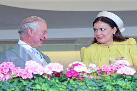 King Charles laughs with comedy star at Ascot as he cheers from the stands with Queen Camilla