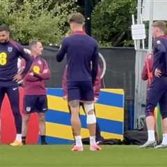 John Stones spotted training in knee strapping